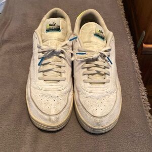 Nike White Athletic Shoes with Blue Accents